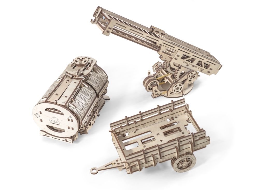 3D-пазл Ugears «Дополнение к грузовику UGM-11» 3D-пазл Ugears «Дополнение к грузовику UGM-11»Ugears<br>Дополнительные обновления для грузовика UGM-11 - реалистичные модели цистерны, лестницы, прицепа. <br> <br><br> Цистерна - оснащена механизмом открывания. Лепестки конструкции раскрываются, если покрутить специальную ручку на крыше цистерны. Емкость бочки поз...<br><br>Артикул: 70019<br>Размер: 36x12x17,5 см<br>Расчетное время сборки: 10-11 часов<br>Материал: Дерево<br>Размер упаковки: 37,5x17x3,5см<br>Возраст: от 14 лет